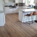 Hardwood floor refinishing in a kitchen